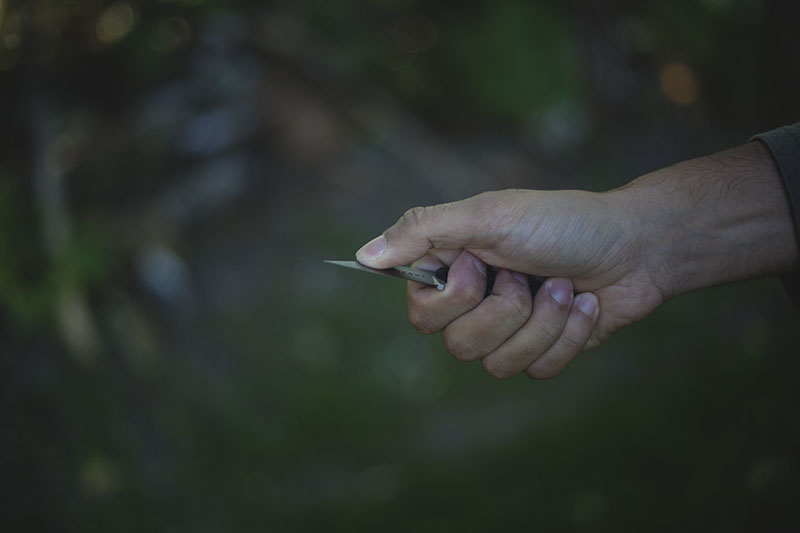 crkt minimalist review neck knife designer alan folts wharncliffe style