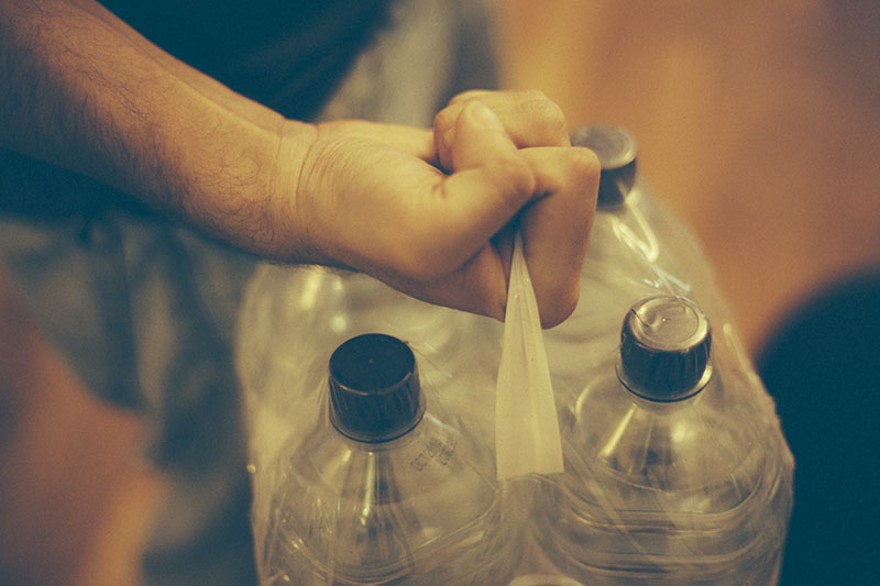 survivalist prepper stockpiling bottled water